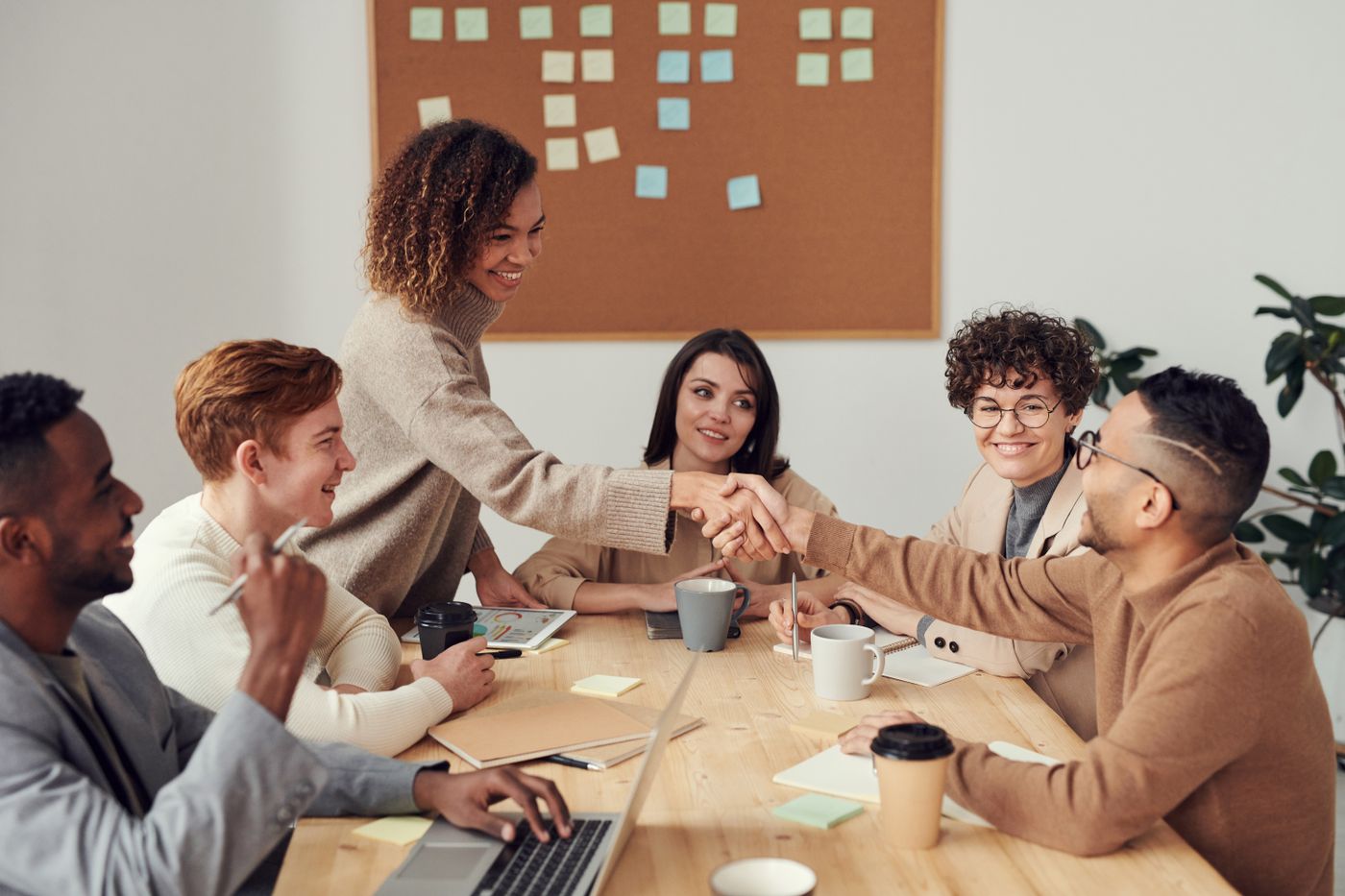 Polished local team collaborating — unique FAQ imagery