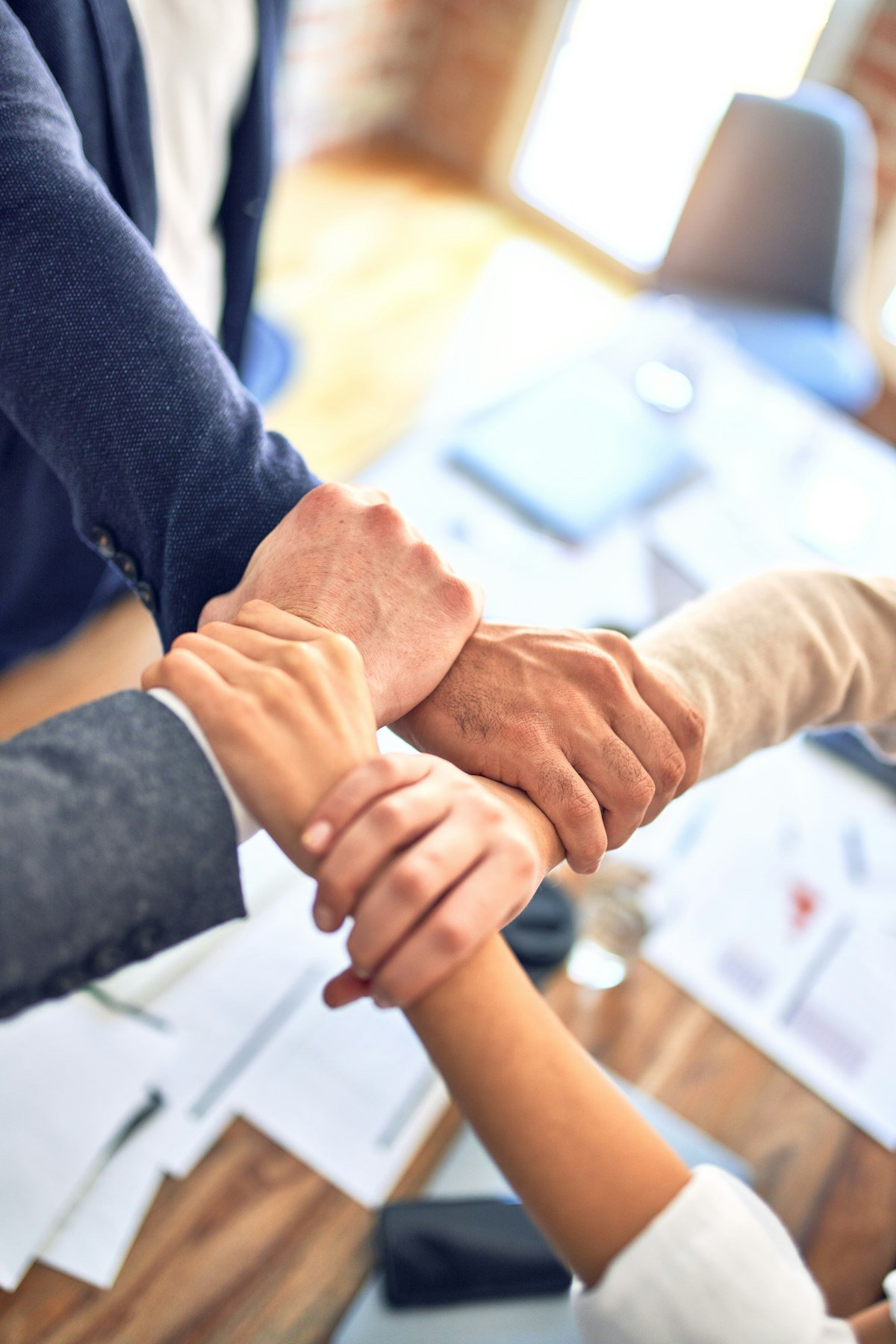 Partnership handshake — strategy session for AI search optimization